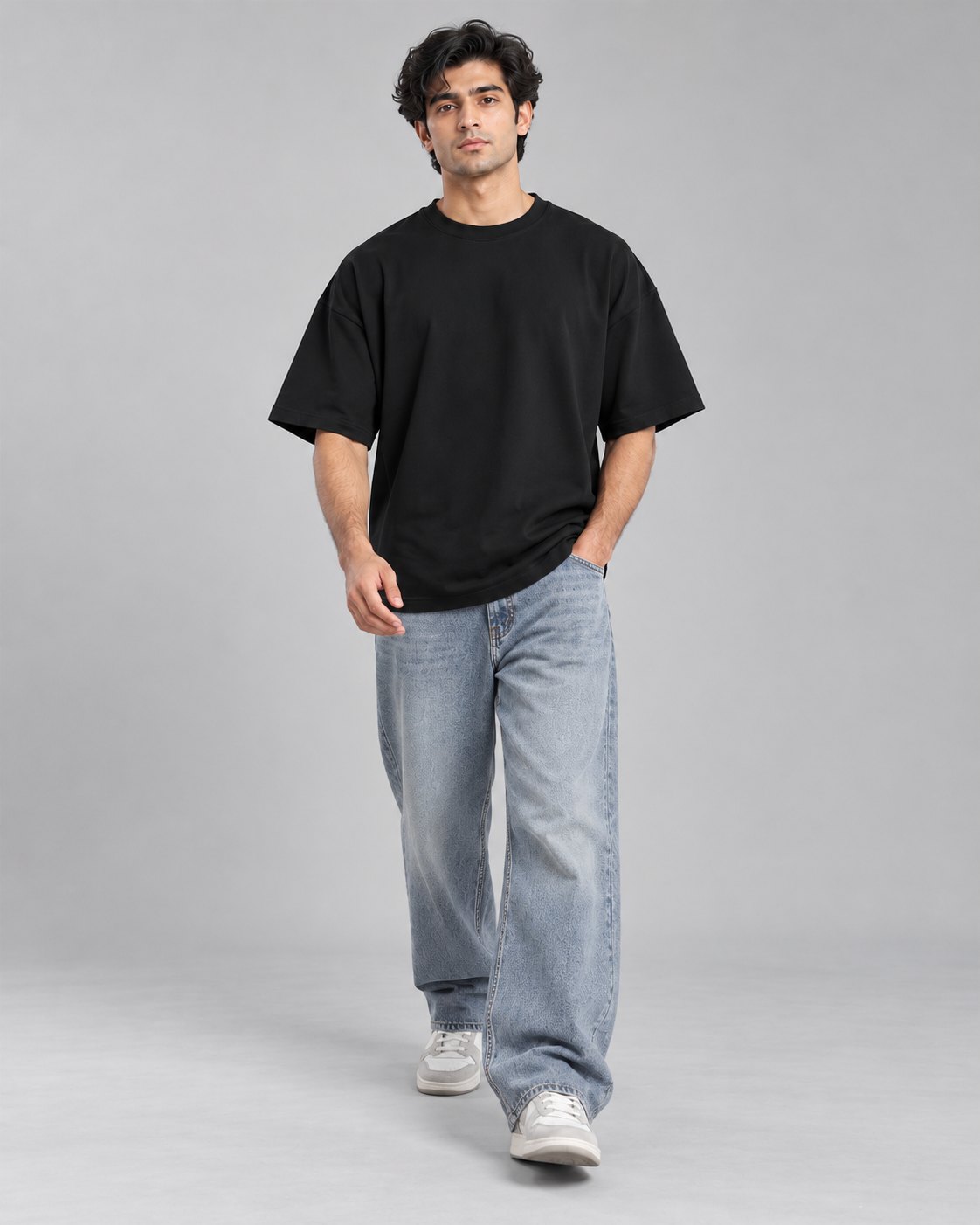 Men wearing a black oversized T-shirt, walking pose