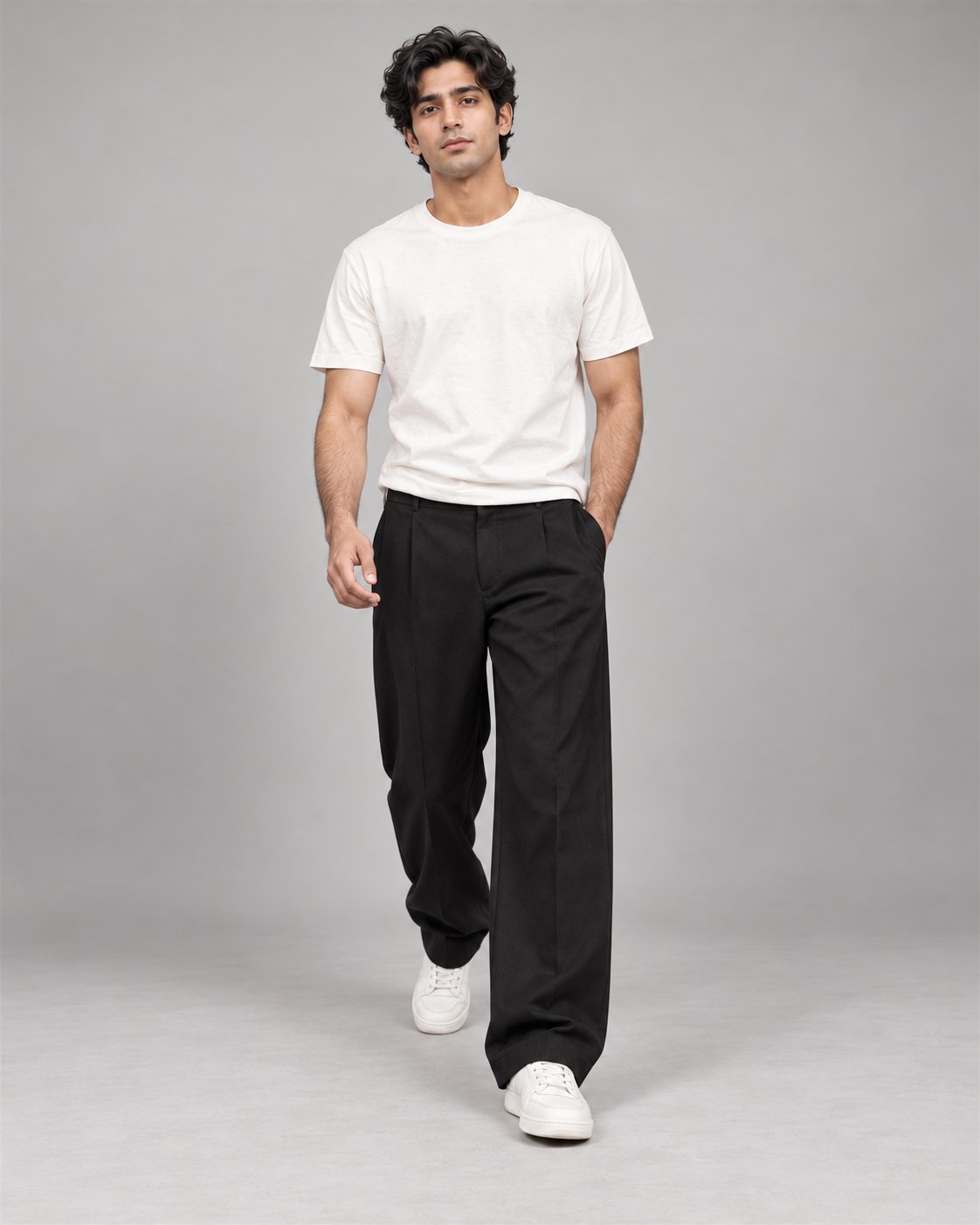 Men wearing black relaxed wide-leg trousers, walking pose