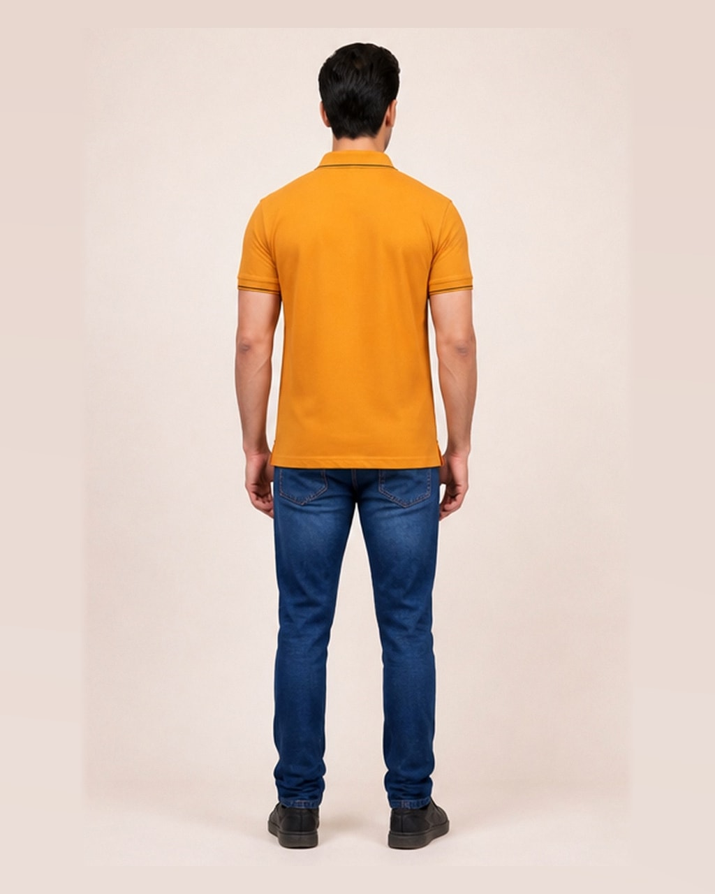 Sleek & Classic: Plain Saffron Yellow Polo T-Shirt for Men — back view