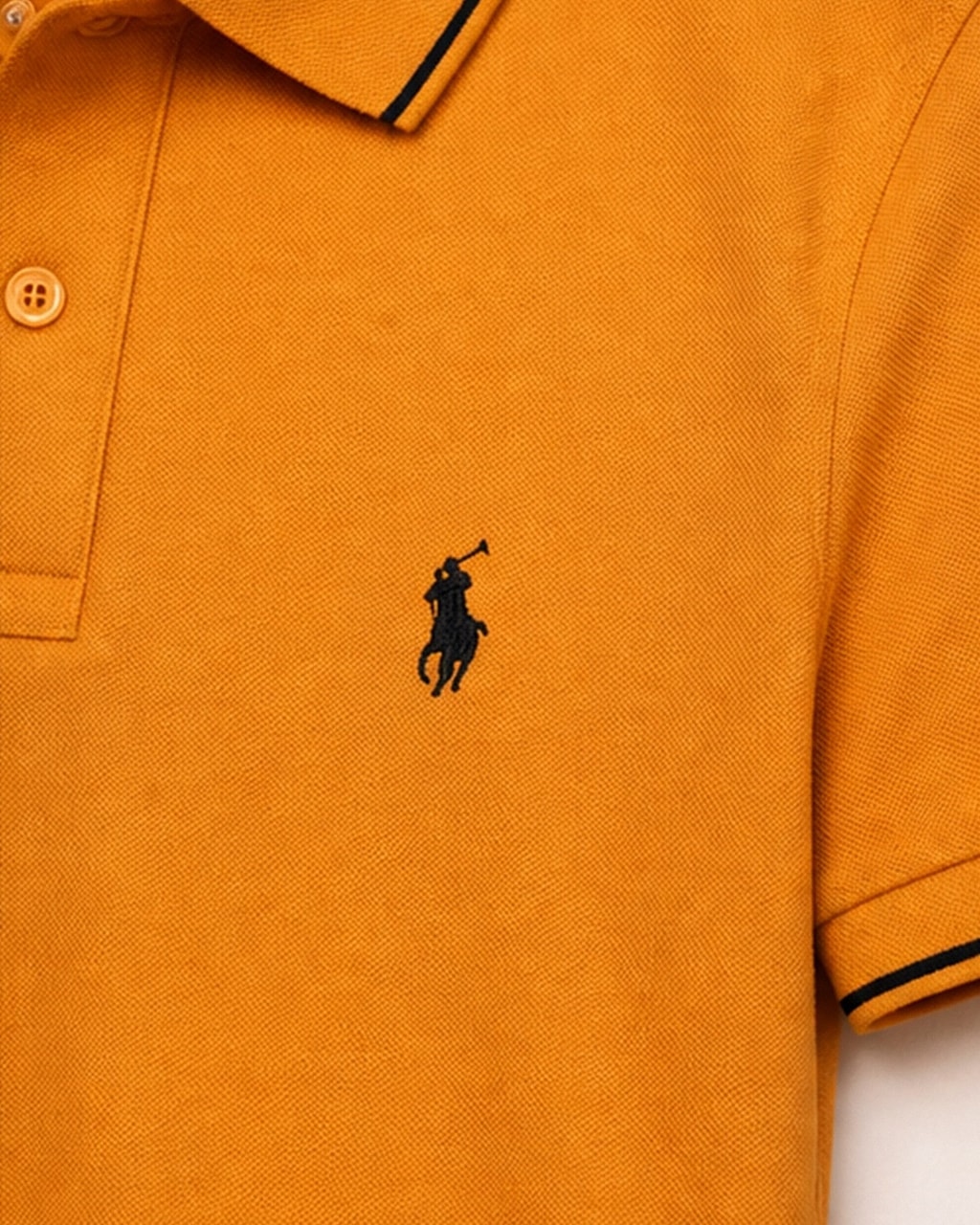 Sleek & Classic: Plain Saffron Yellow Polo T-Shirt for Men detail view