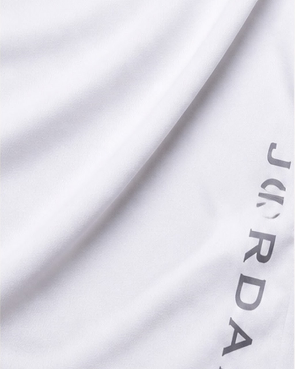 Reflective Logo White Dry Fit Tee closeup view