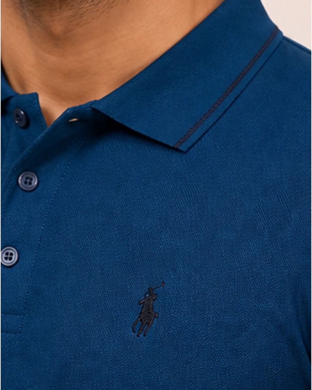 Sleek & Classic: Plain Blue Polo T-Shirt for Men closeup view