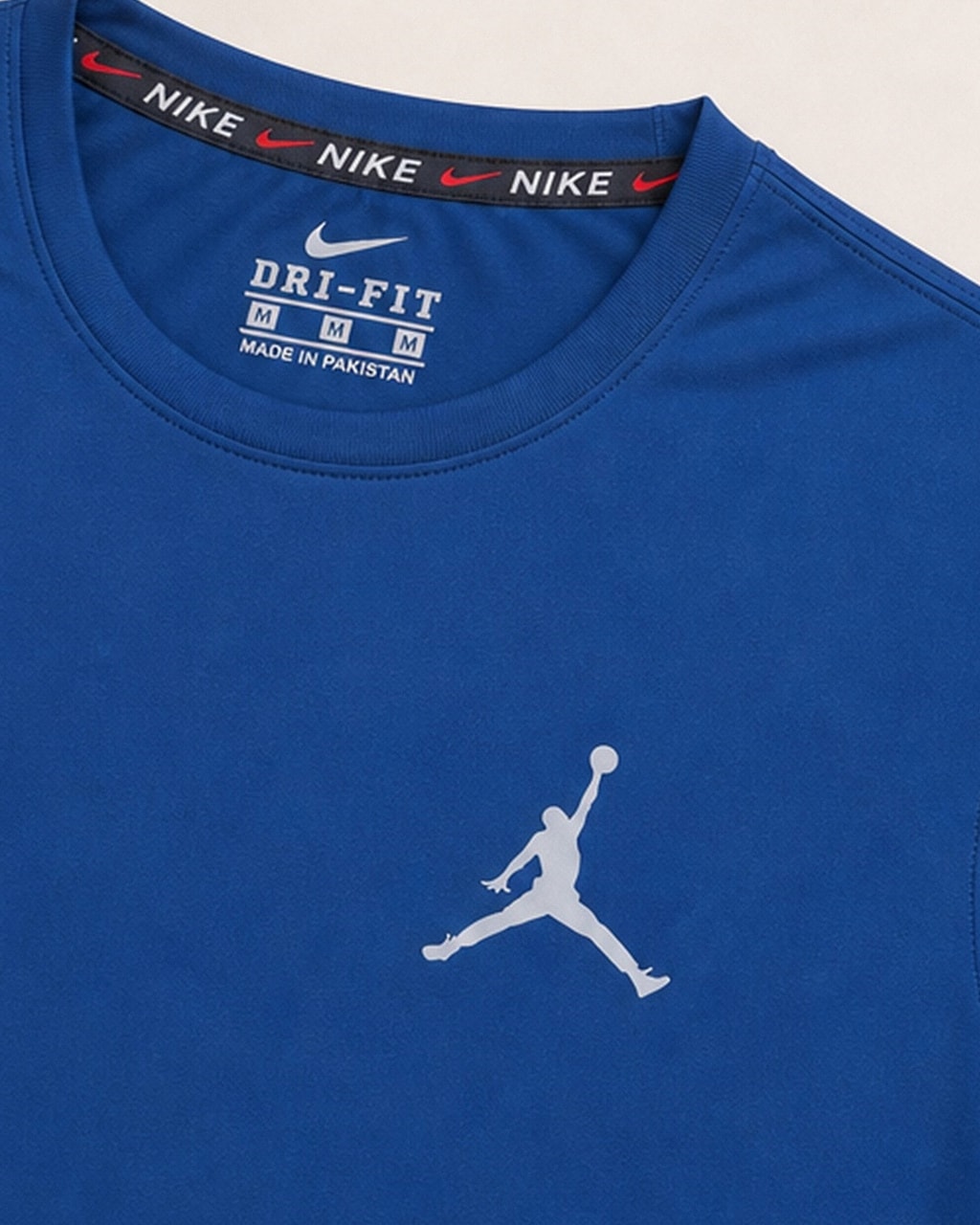 Reflective Logo Blue Dry Fit Tee detail view